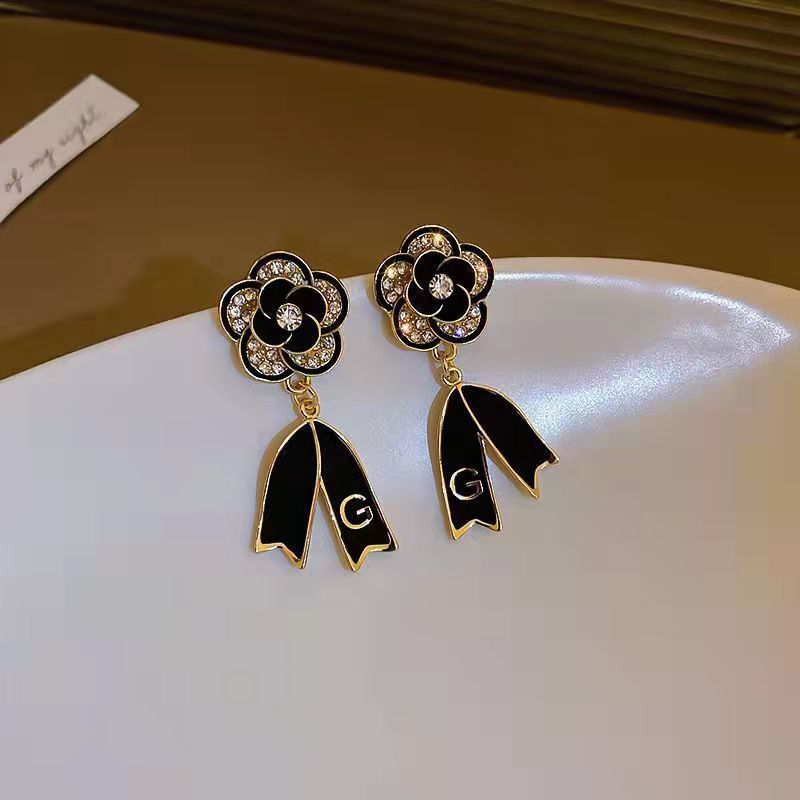 Black Camelia Bow Letter Earrings