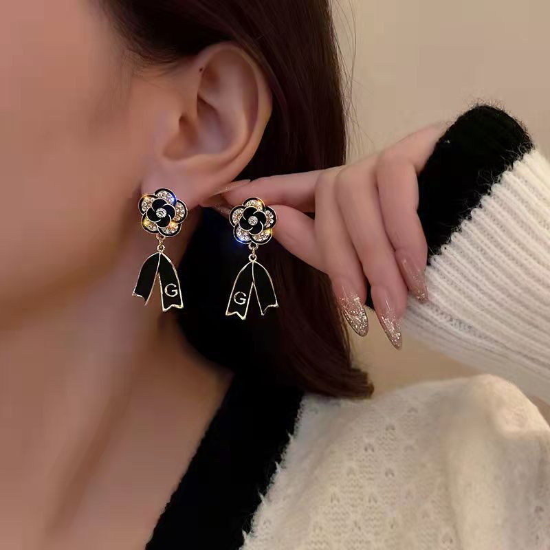 Black Camelia Bow Letter Earrings
