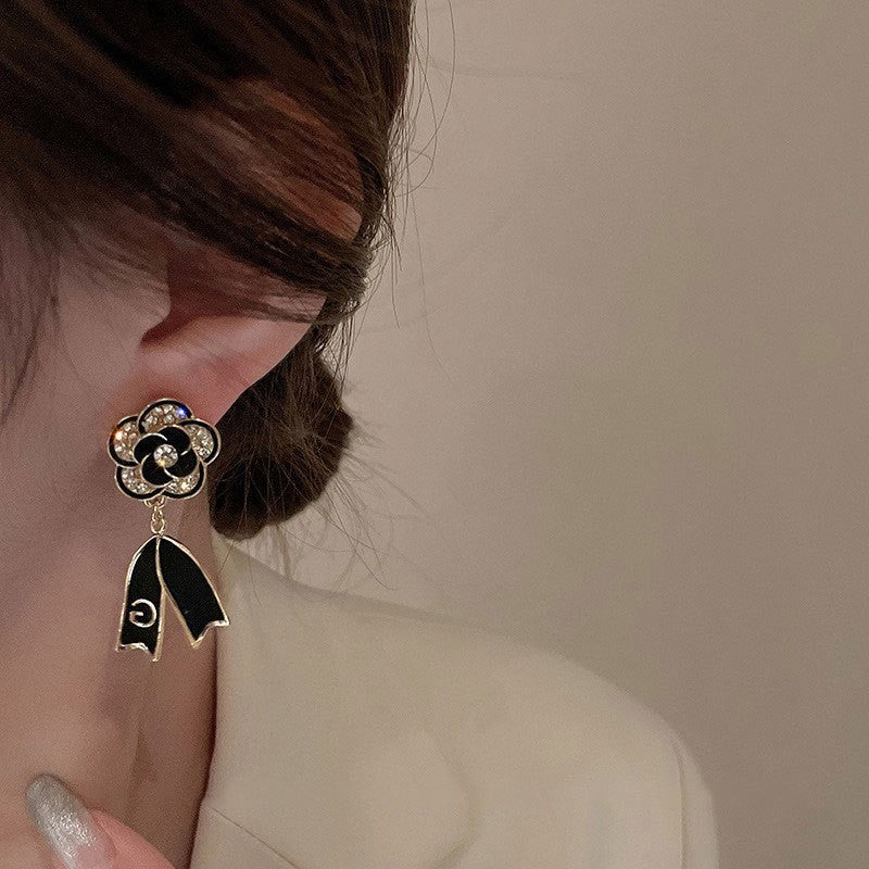 Black Camelia Bow Letter Earrings
