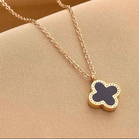 Two-Sided Black & White Clover Necklace